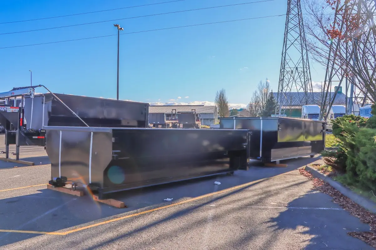 Roll-off dumpster ready for waste disposal at job site for 8 Yard Dumpster Rental in Montgomery